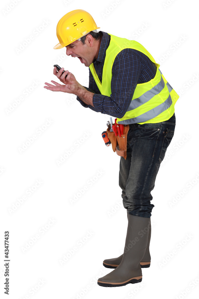 foreman screaming in a mobile phone foreman screaming in a mobile phone