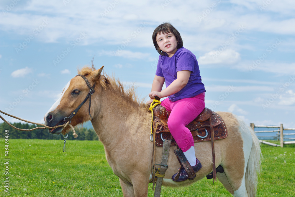Obraz premium child ride pony