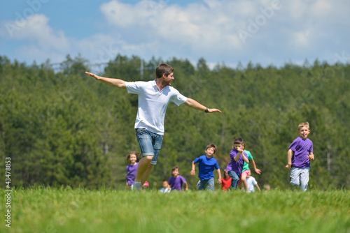 happy kids group have fun in nature