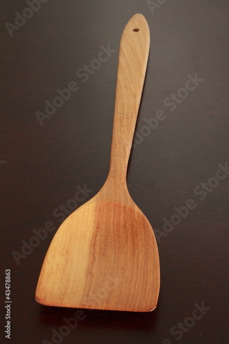 Wooden spade of frying pan
