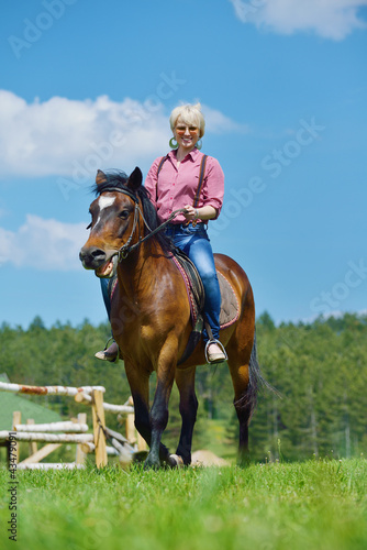 happy woman on horse