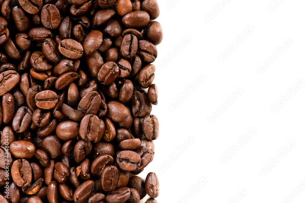 Coffee beans on the white background with copy space Coffee beans on the white background with copy space