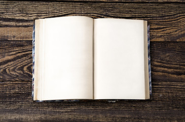 Aged book on wooden table