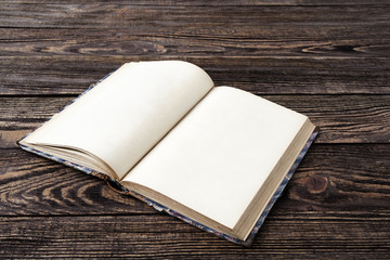 Aged book on wooden table