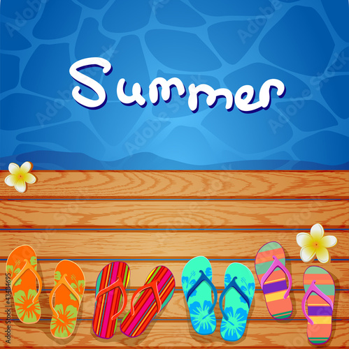 flip flops on the wood background