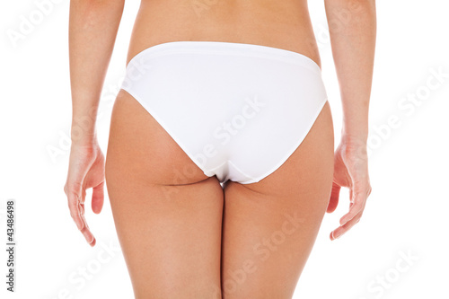 Po einer attraktiven wieblichen Person in weißer Unterwäsche © Kaesler Media