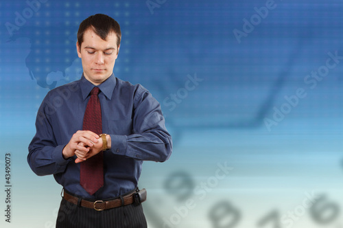 businessman looking at his watch