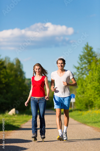 Young couple doing sports outdoors