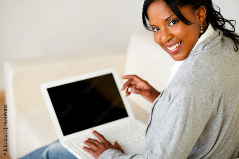 Beautiful black female working on laptop Beautiful black female working on laptop