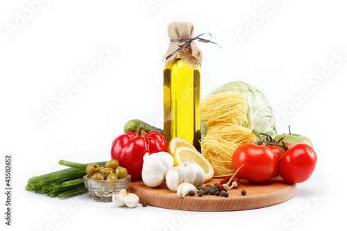 Fototapeta Naklejka Na Ścianę i Meble -  set fresh vegetables with olive oil isolated on white background