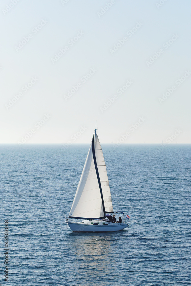 Lonely yacht in the open sea