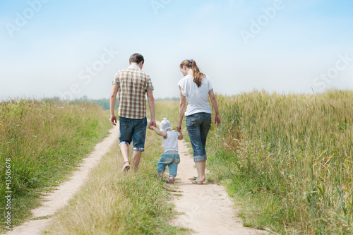 Happy family in a field