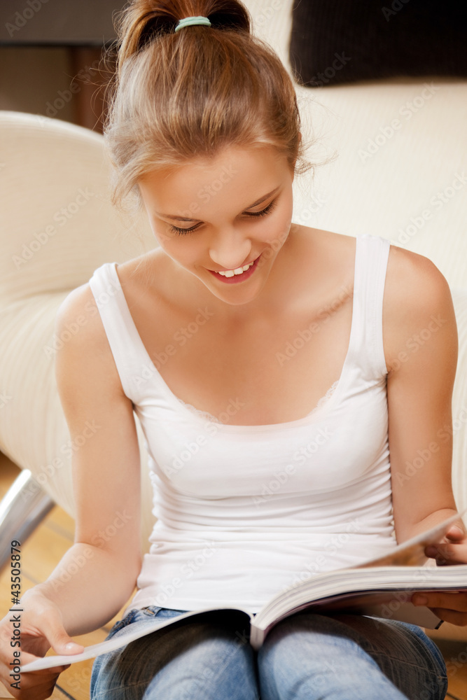 happy and smiling teenage girl with magazine happy and smiling teenage girl with magazine