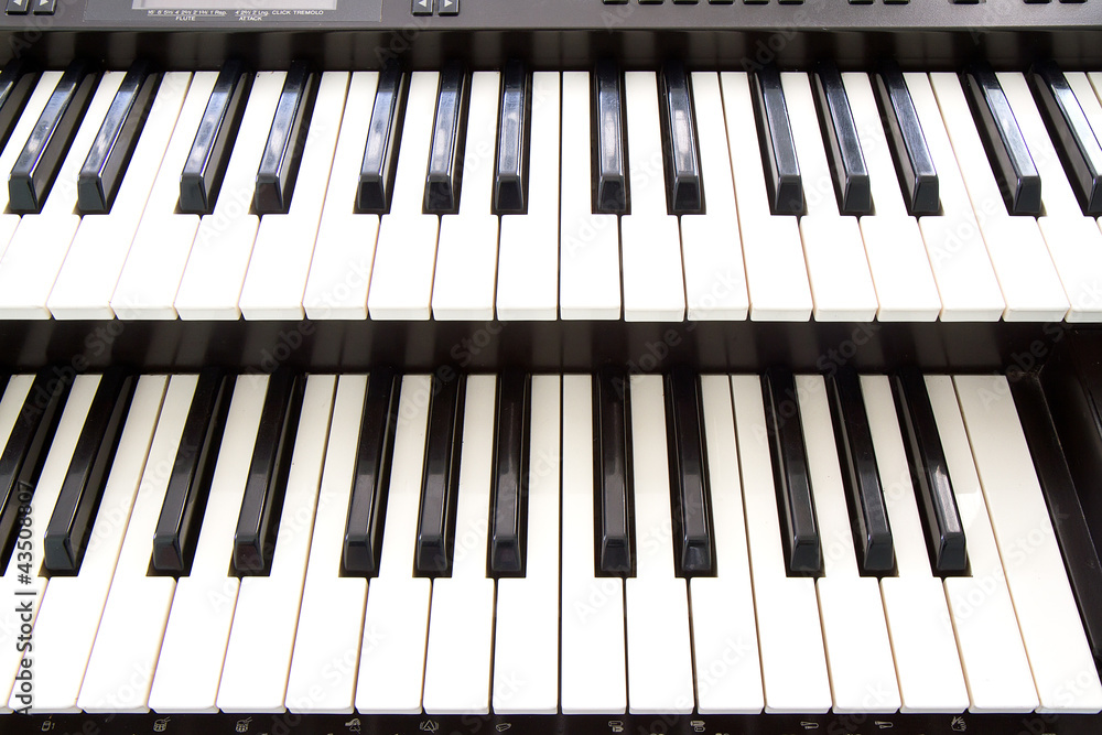 electronic piano keyboard keys closeup in black and white electronic piano keyboard keys closeup in black and white