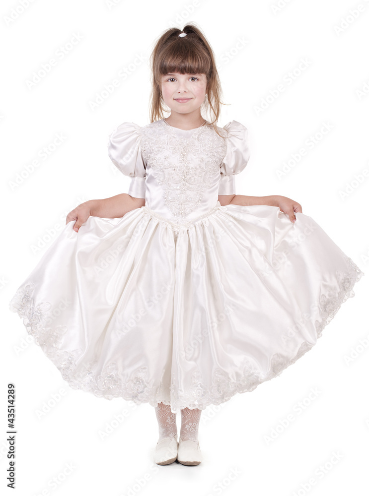 Little beautiful girl in the fashion dress