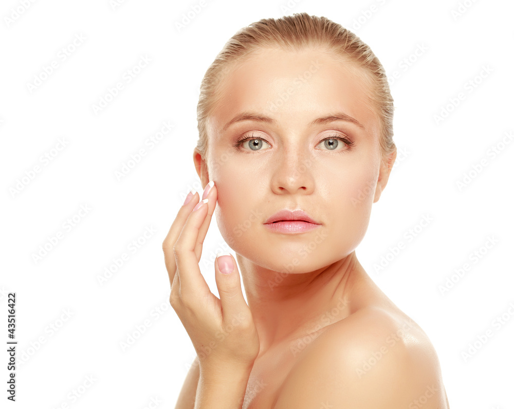 Young woman touching her face isolated on whire background Young woman touching her face isolated on whire background