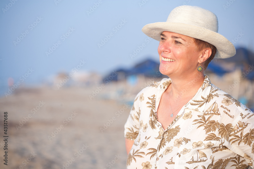 Portrait of a elegant mature woman enjoying the sunshine