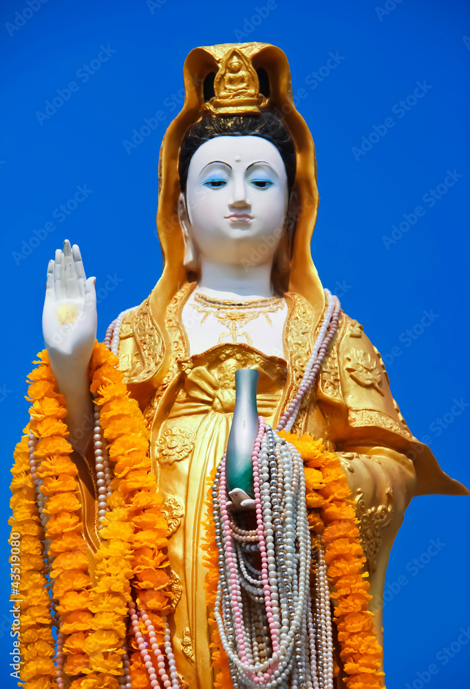kuan yin statue and blue sky Stock Photo Adobe Stock