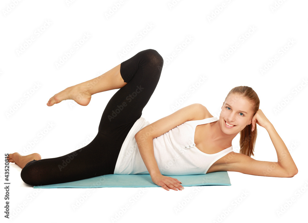 Young woman doing exercise isolated on white background