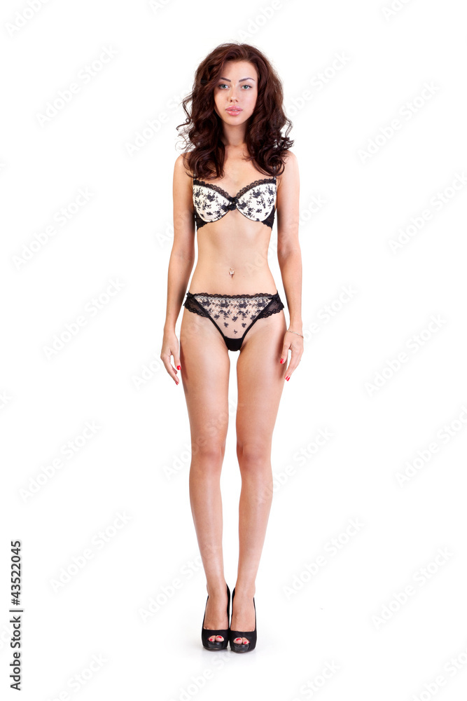 Beautiful underwear model posing on a white Beautiful underwear model posing on a white