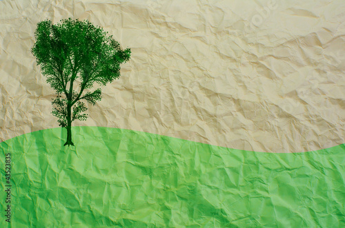 tree on recycled paper
