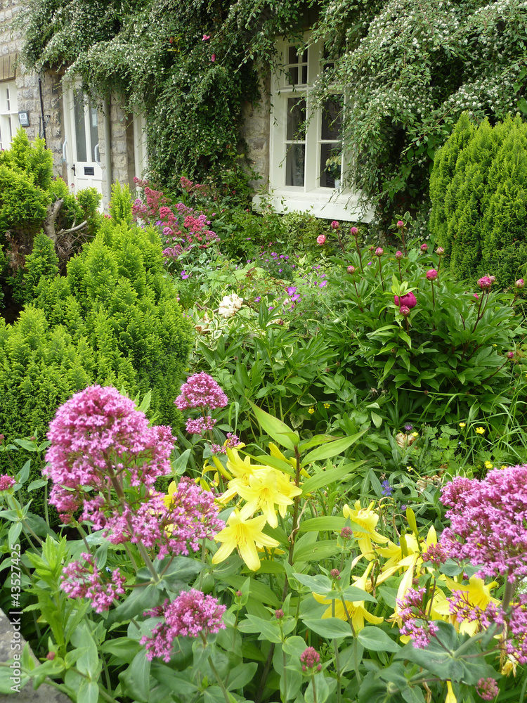 Postcard view of English terraced cottage gardens