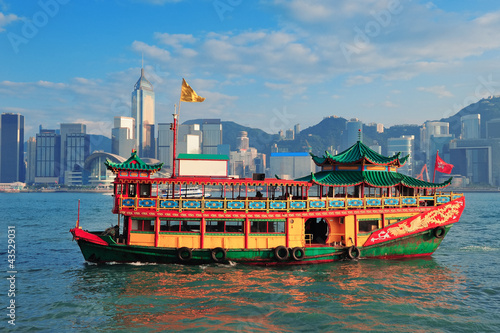 Hong Kong skyline with boats photo