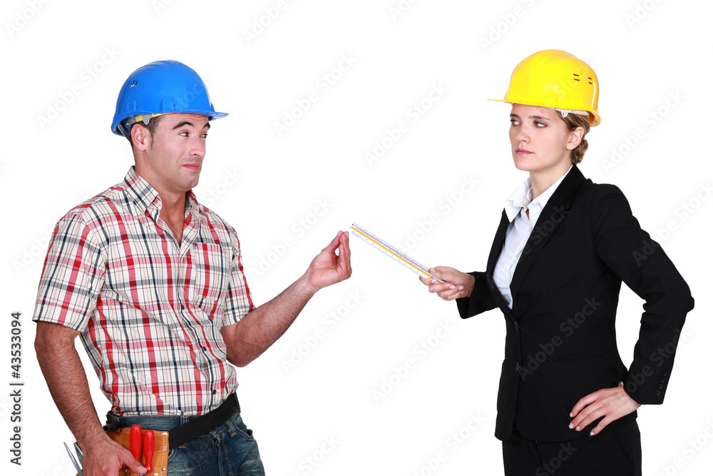 Architect and foreman in discussion Architect and foreman in discussion
