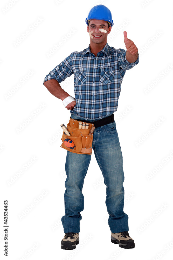 Injured builder giving the thumbs-up