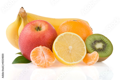 fresh fruits and slices isolated on white