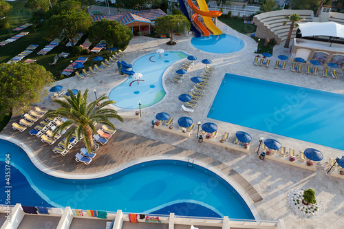Fototapeta Naklejka Na Ścianę i Meble -  Swimming pool at the modern luxury hotel