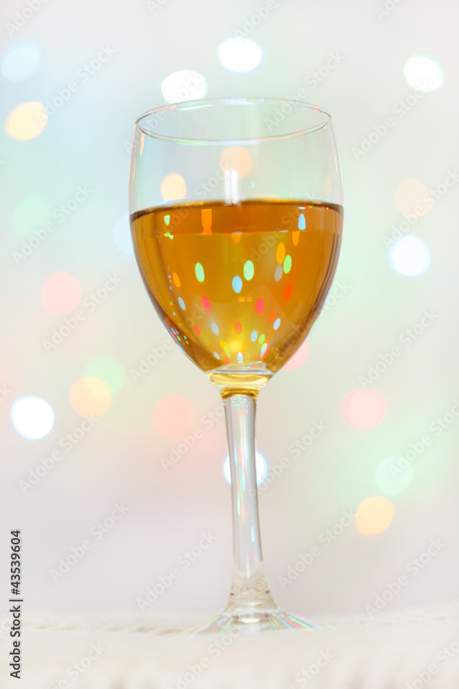 Glass of White Wine with Lights Background Glass of White Wine with Lights Background