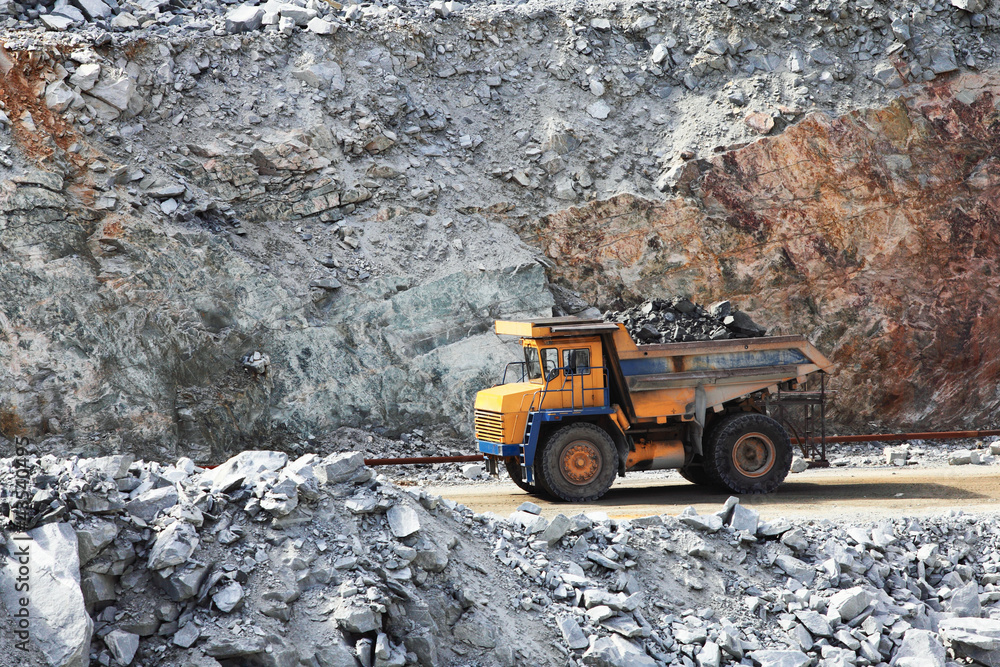 Truck of mining in open cast. Minerals industry Truck of mining in open cast. Minerals industry
