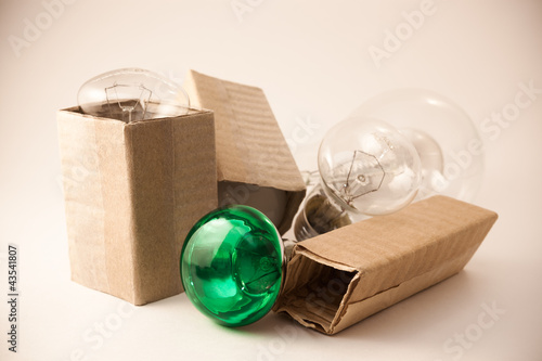 Old incandescent light bulbs in cartons