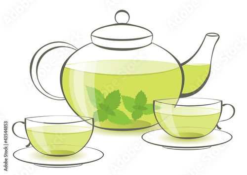 Mint tea in a teapot and cups made from glass