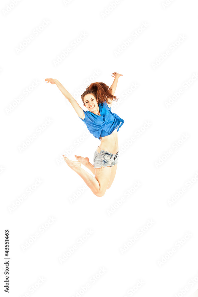 Girl with blue shirt jumping