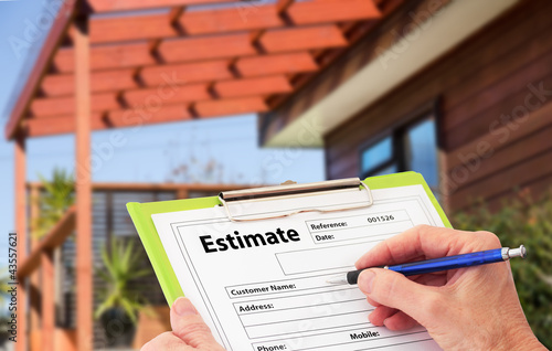 Hand Writing an Estimate for Home Building Renovation