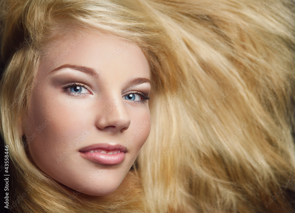 shot of young beautiful girl with long blond hair and stylish ma shot of young beautiful girl with long blond hair and stylish ma