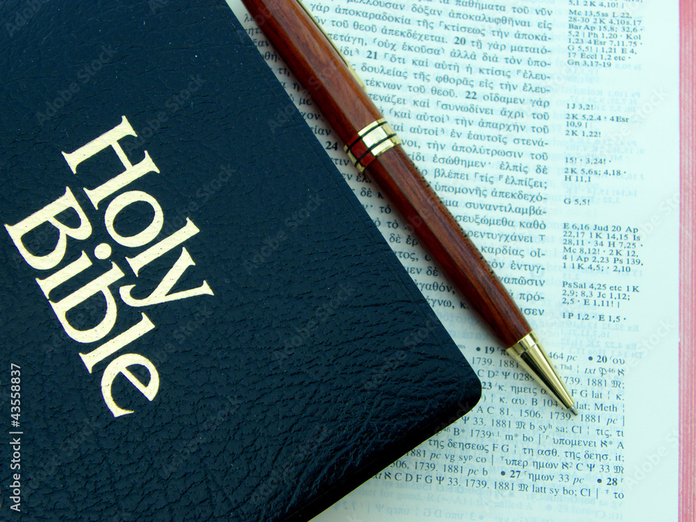 Bible, pen on original greek text Stock Photo