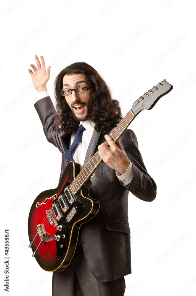Fototapeta premium Guitar player in business suit on white