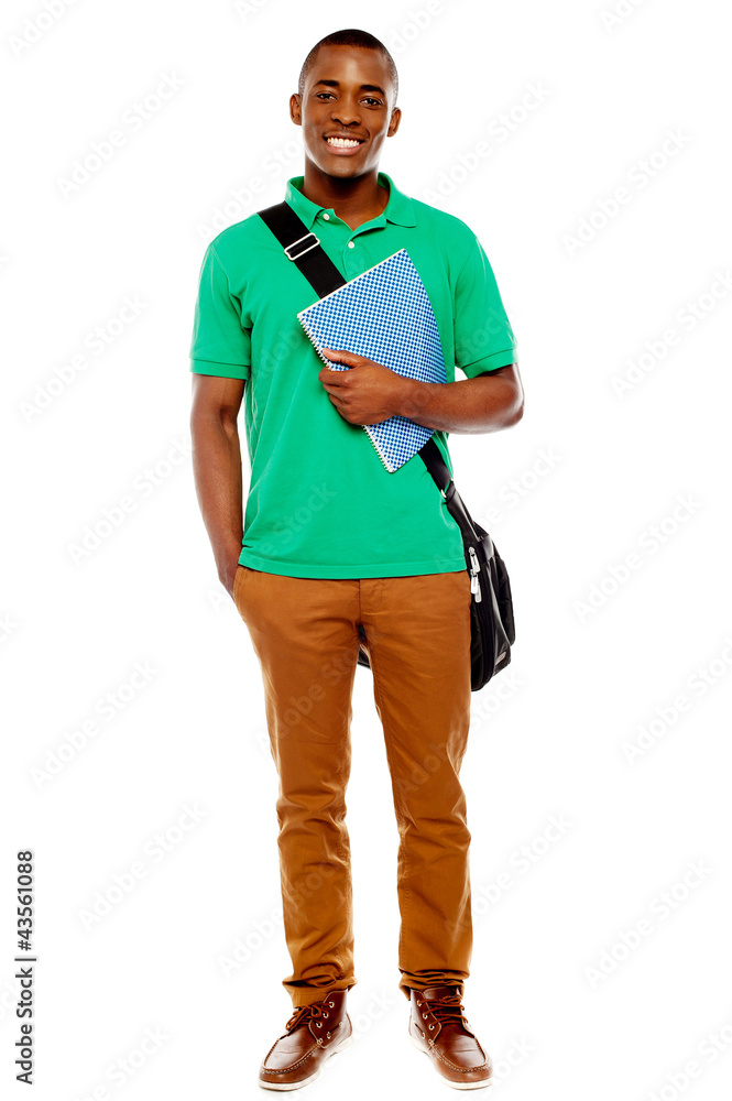 Fototapeta premium Student carrying laptop bag and notebook