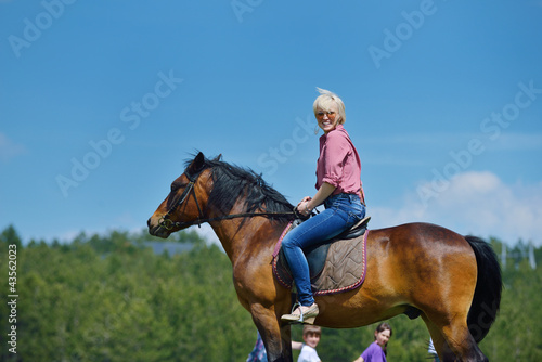 happy woman ride horse