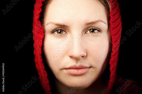 portrait of young woman with red hood