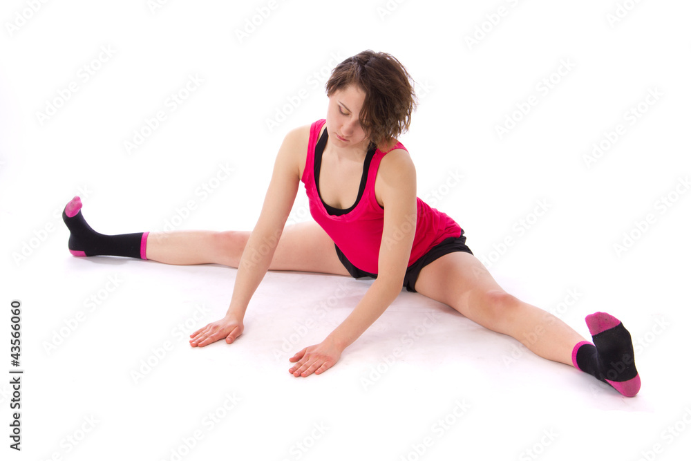 Young female doing exercise on white background Young female doing exercise on white background