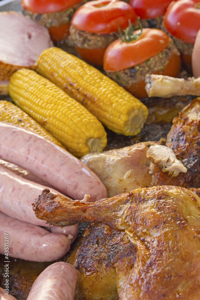 Assorted pieces of grilled vegetables, meat and chicken ready fo Assorted pieces of grilled vegetables, meat and chicken ready fo
