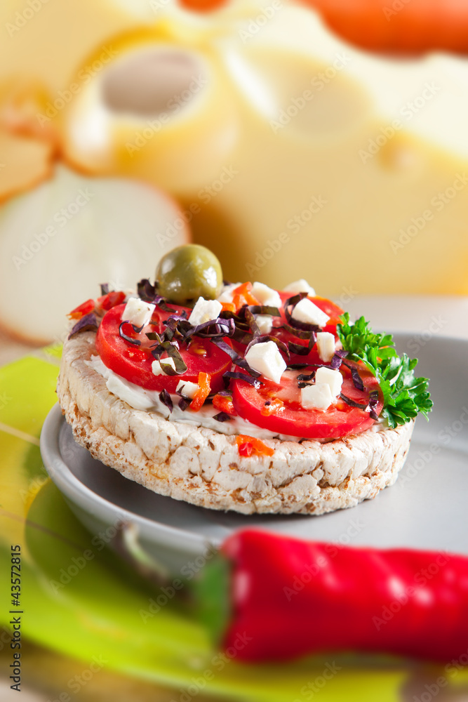 Healthy breakfast, crispbread with cheese and vegetables