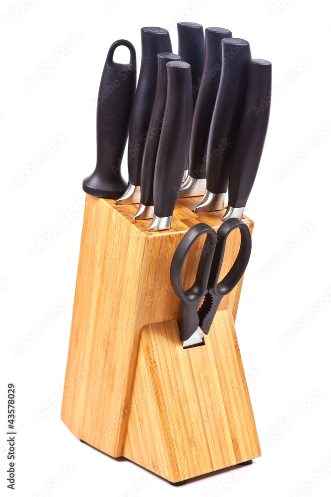 Set of kitchen accessories - knives and scissors in wooden block Set of kitchen accessories - knives and scissors in wooden block