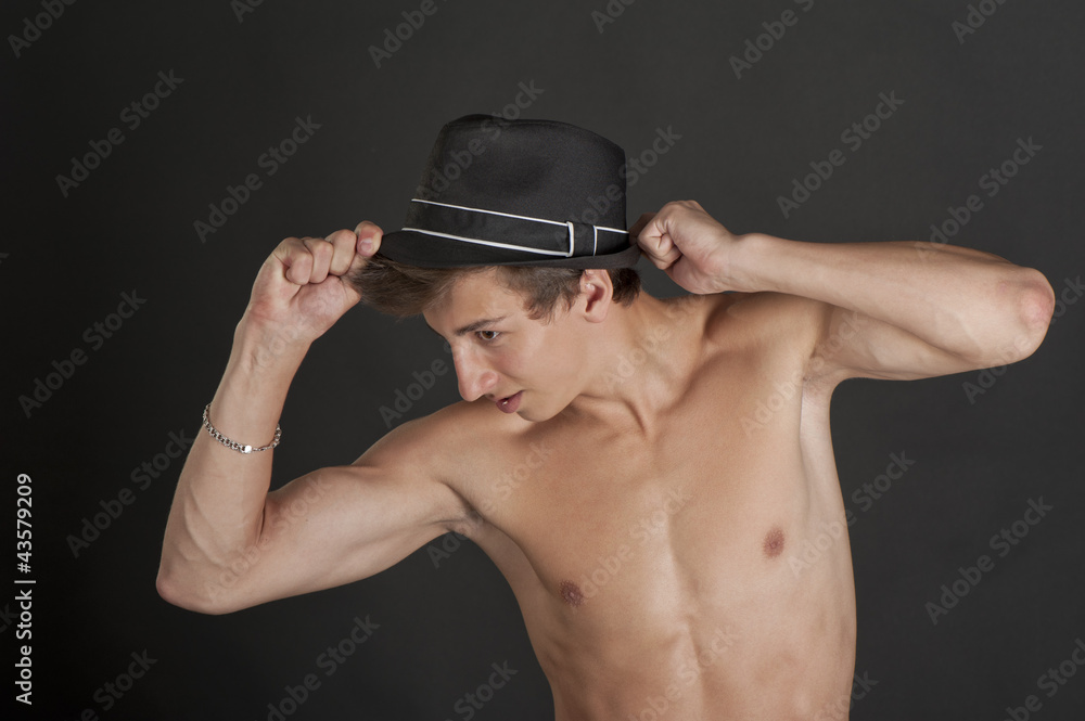 Young guy with a black hat Young guy with a black hat