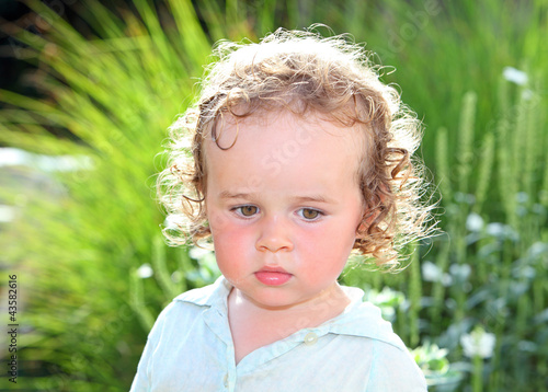 Wallpaper Mural Infant portrait in nature with back-light. Torontodigital.ca