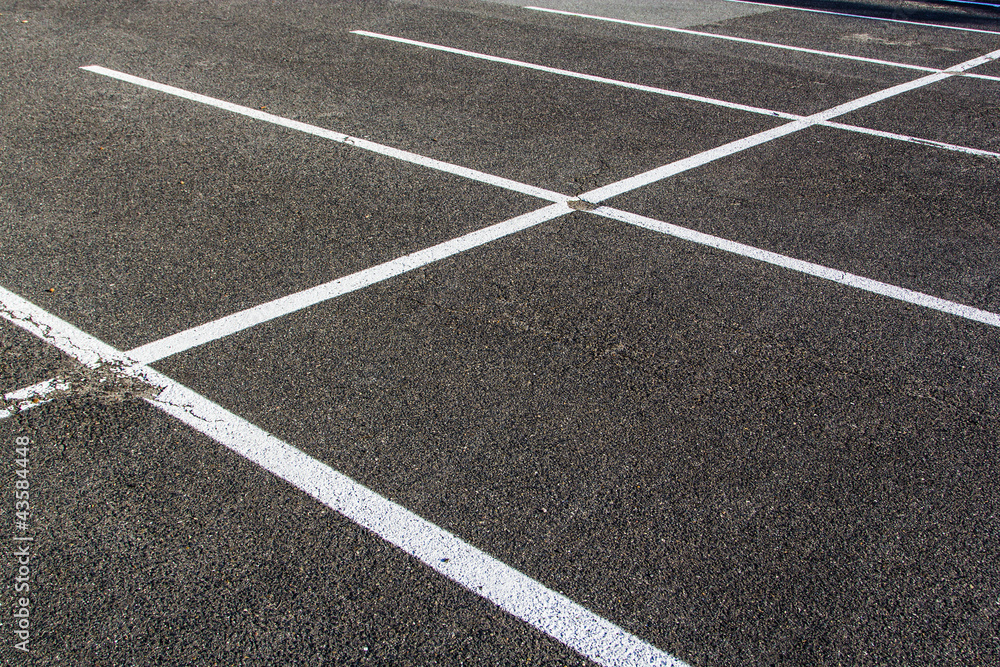 lines for parking lots drawn on the asphalt